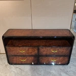 Italian Light Luxury Sideboard with High-Gloss Natural Wood Veneer Four Drawers Open Display Shelf and Gold Wing-Shaped Pulls